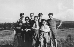 A group of Jewish children pose outside in the town of Le Chambon.