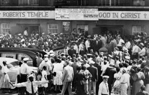 A large crowd gathers outside the Roberts Temple Church of God In Christ in Chicago, Ill., Sept. 6, 1955 as pallbearers carry the casket of Emmett Till, a 14-year-old African-American boy who was slain while on a visit to Mississippi. Police estimate a crowd of about 2,000. 