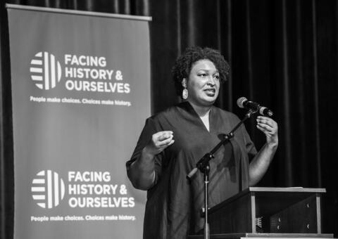 Stacey Abrams speaking at a Facing History & Ourselves event
