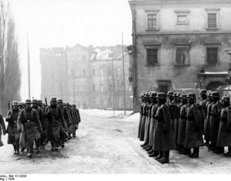 Nazi officers stand guard and march at Wawel Castle in Krakow, Poland.