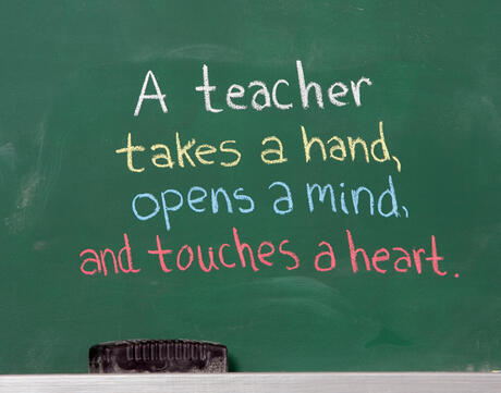 A Teacher Takes A Hand, Opens A Mind, And Touches A Heart