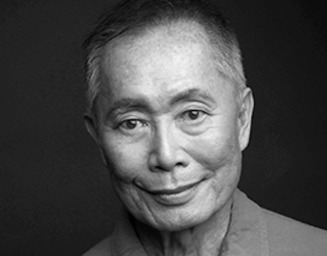 A black and white photo of George Takei